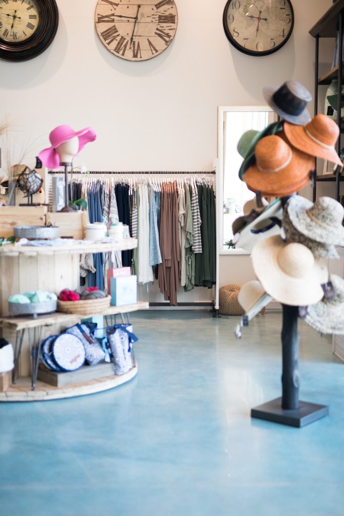 Inicio 1 Interior of clothing store shop vintage clothes, hats and homewares clocks