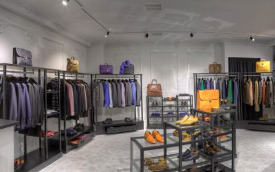 Suits and shoes in clothing store for men Suits and shoes in clothing store for men